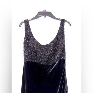 Stunning Carmen Mark Valvo black gown with black sequins and velvet materials.